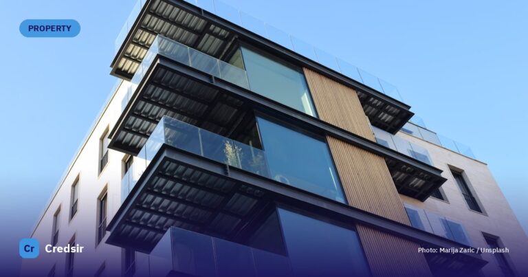 White and black concrete building — cover photo for Credsir’s Freehold vs Leasehold Property guide