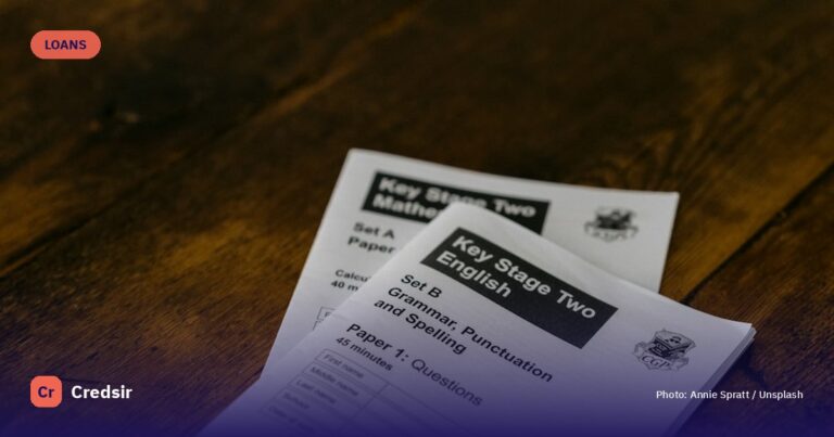 White printer paper on brown wooden table — cover photo for Credsir’s Instant Personal Loan Online guide