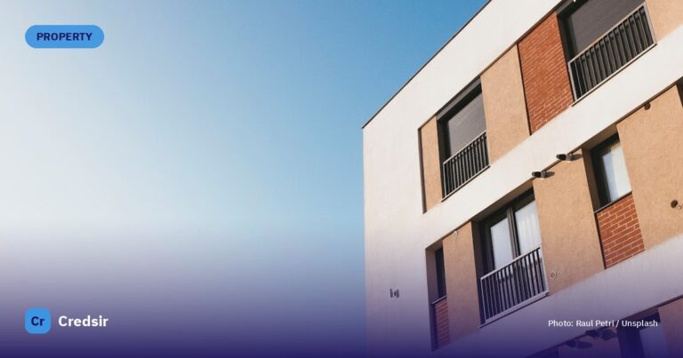 White and brown concrete building under blue sky during daytime — cover photo for Credsir’s Ghmc Property Tax Hyderabad guide