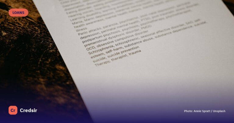 White printer paper on black and brown granite table — cover photo for Credsir’s Best Loan Apps in India guide