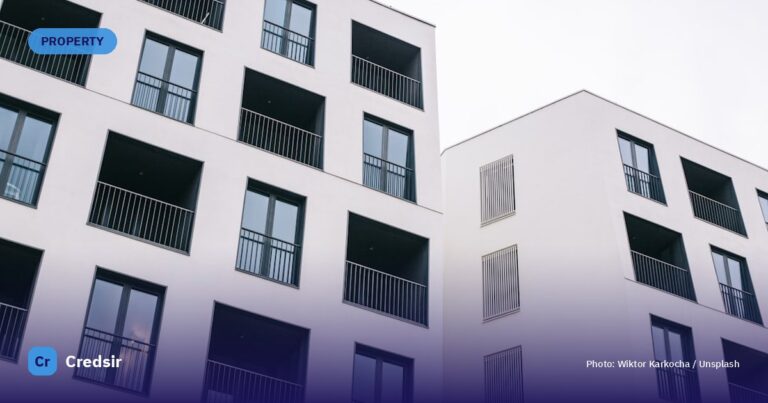 White concrete building at daytime — cover photo for Credsir’s RERA Gujarat Project Search guide