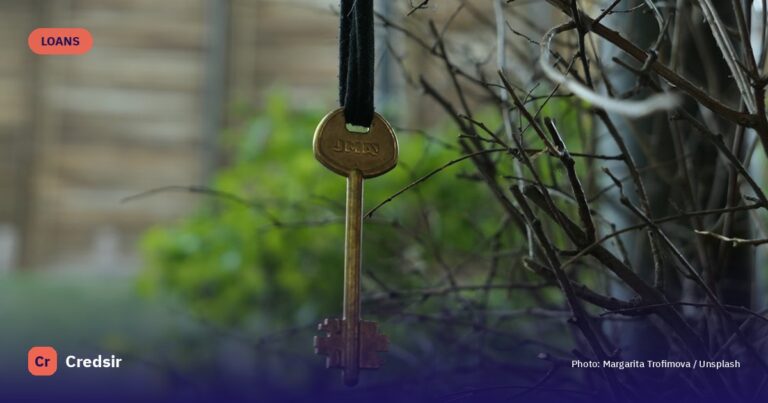 A gold key hanging from a tree branch — cover photo for Credsir’s Instant Loan Without Documents guide