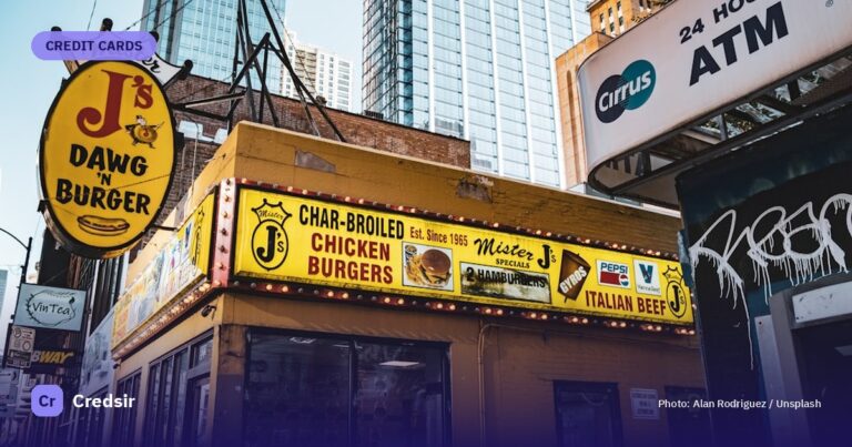 A yellow restaurant with signs — cover photo for Credsir’s YES Bank EMI Credit Card guide