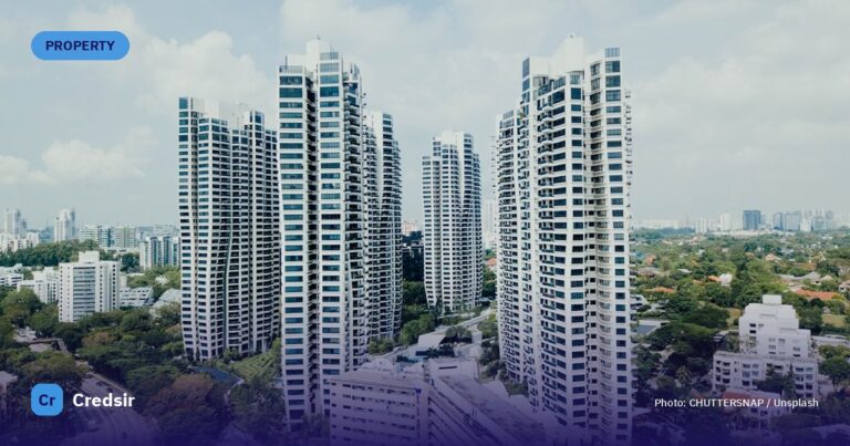 White high rise buildings under white clouds — cover photo for Credsir’s RERA Rajasthan Project Search guide