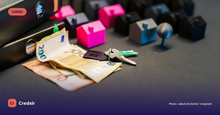 Real estate concept with money, keys, and tiny houses — cover photo for Credsir’s Lowest Best Home Loan Interest Rates guide