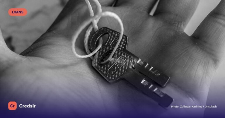 Two keys tied together resting in a palm — cover photo for Credsir’s Education Loan for Studying Abroad guide