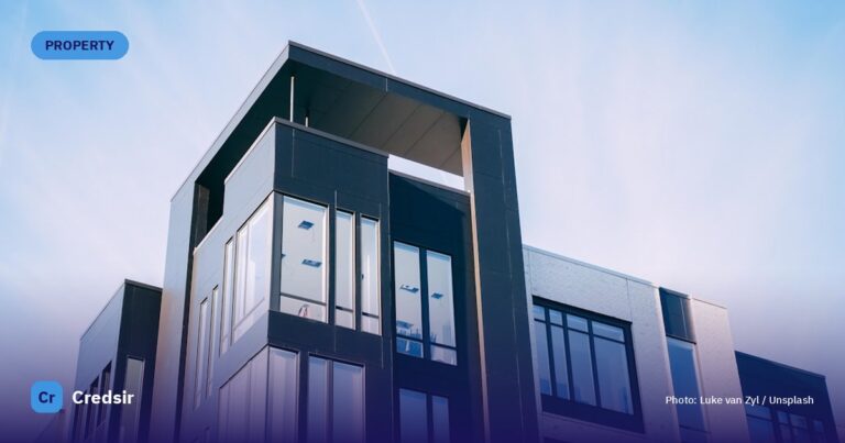 Black and white cocnrete building low-angle photography — cover photo for Credsir’s TS RERA guide
